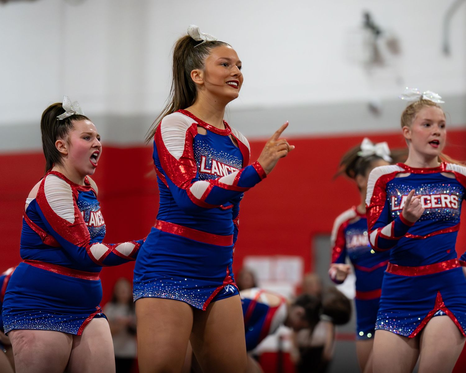 Fv3 Media Ambassador Sayde Thompson - Cheerleader Captain for Londonderry High School cheering as a base at a NHIAA spirit competition