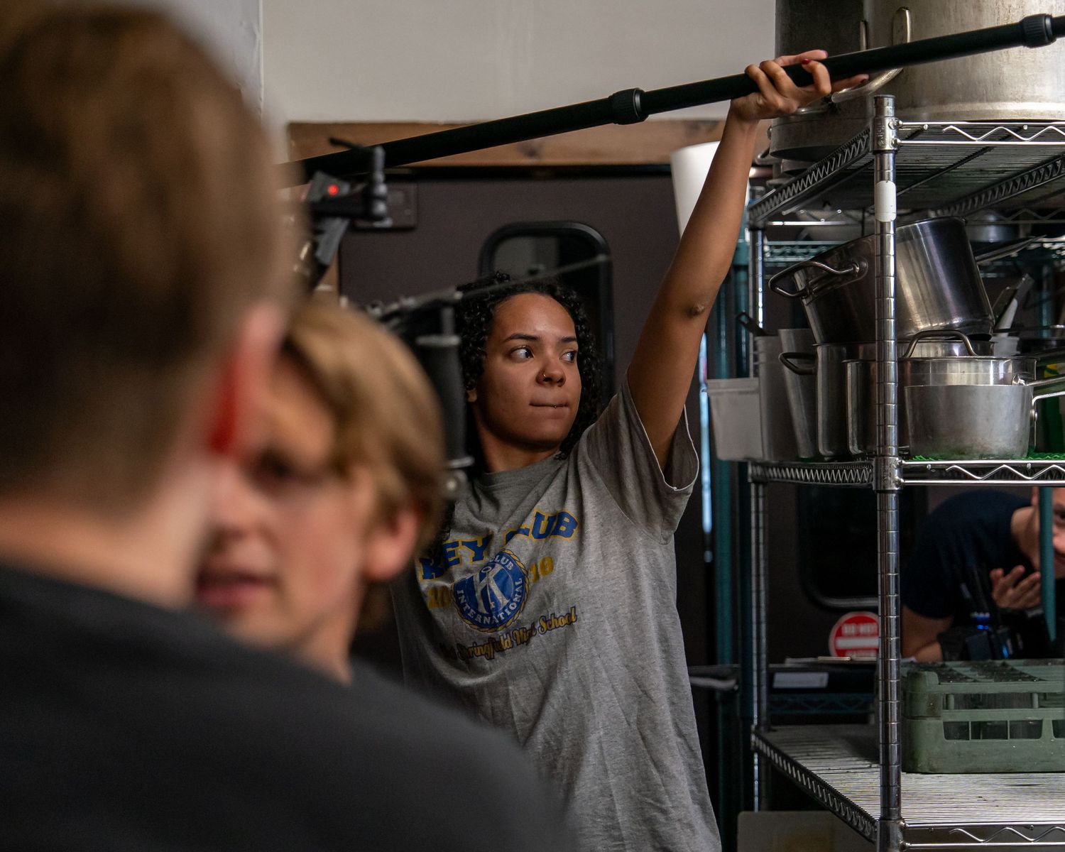 Behind the scenes photo of boom operator Alleyna Pitaso on the set of New England hiking drama feature film All You Have in Lincoln NH