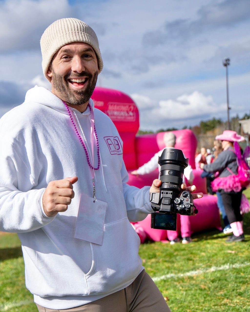New England photographer Frank Fichera III of Fv3 Media takes candid phots at walk against Breast Cancer event in Manchester New Hampshire