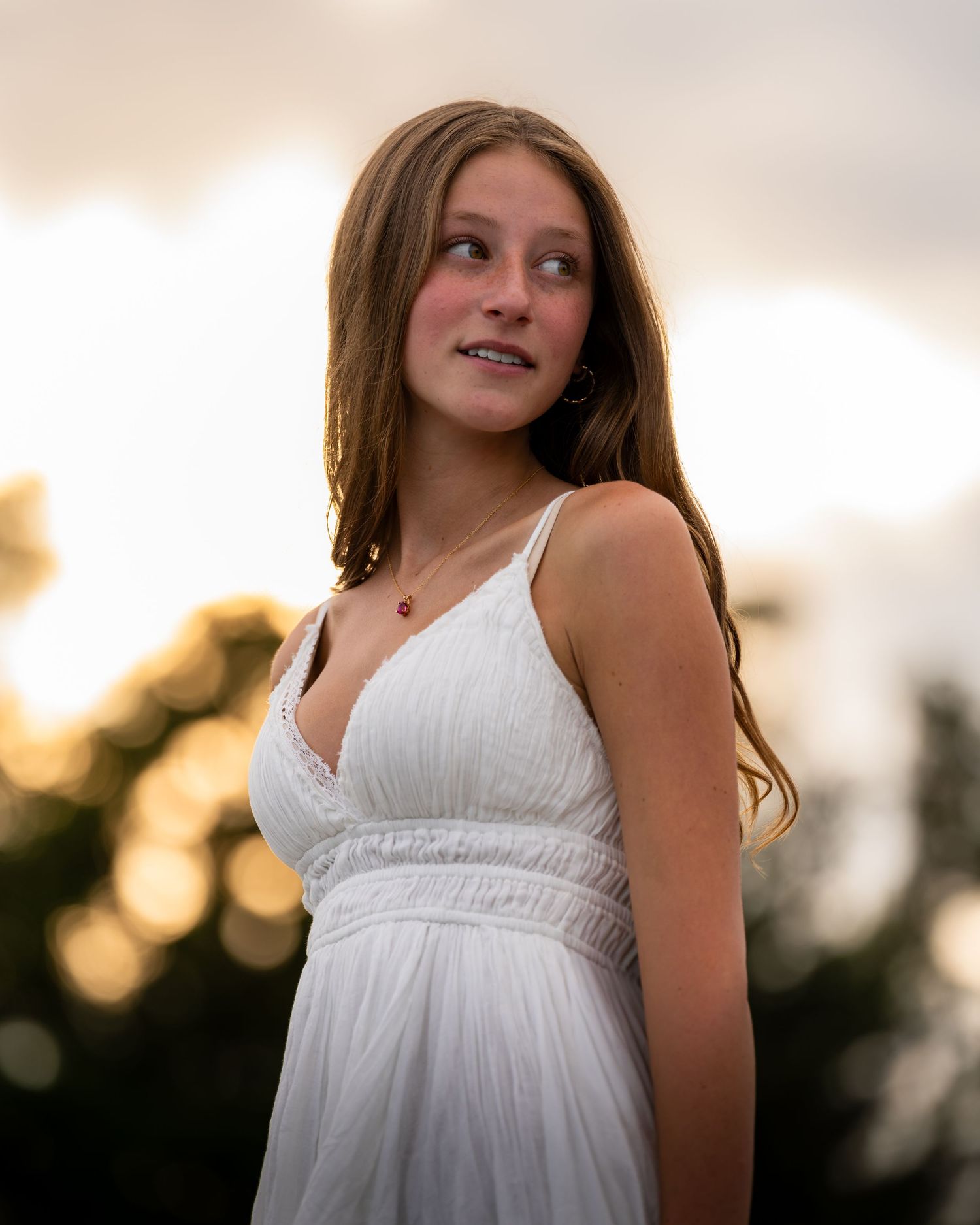 Exeter New Hampshire High School senior graduate celebrates senior photo portrait session in New England at golden our by the ocean