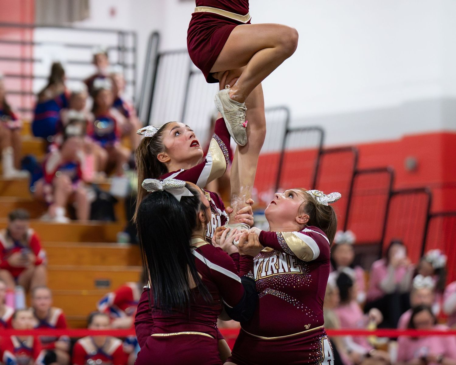 Fv3 Media Athlete Ambassador Abby Labonte - Cheerleader Captain for Alvirne High School cheering as a base at a NHIAA spirit competition