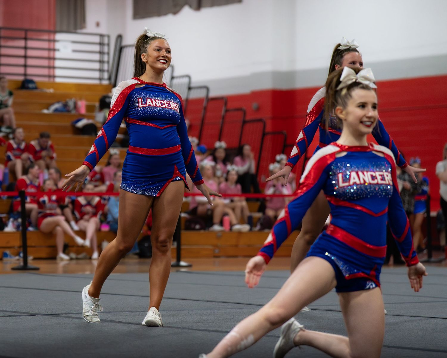 Fv3 Media Ambassador Sayde Thompson - Cheerleader Captain for Londonderry High School cheering as a base at a NHIAA spirit competition