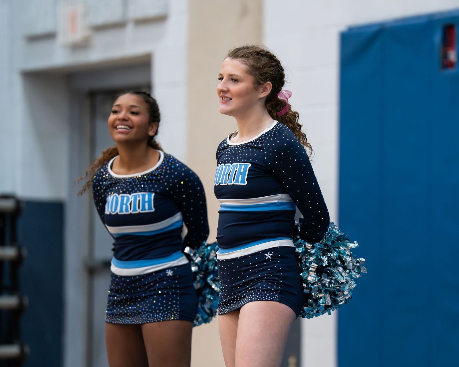Fv3 Media Ambassador Riley Russell - Cheerleader Captain for Nashua North High School cheering as a base at a NHIAA spirit competition