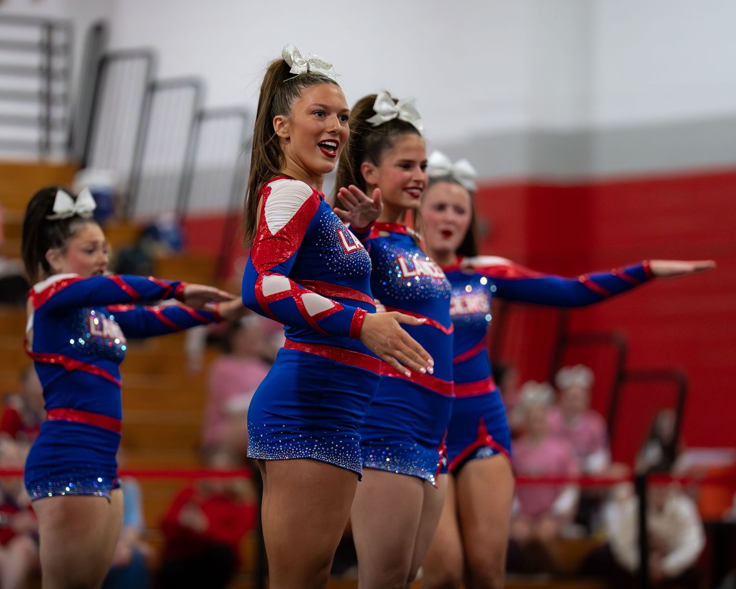 Fv3 Media Ambassador Sayde Thompson - Cheerleader Captain for Londonderry High School cheering as a base at a NHIAA spirit competition