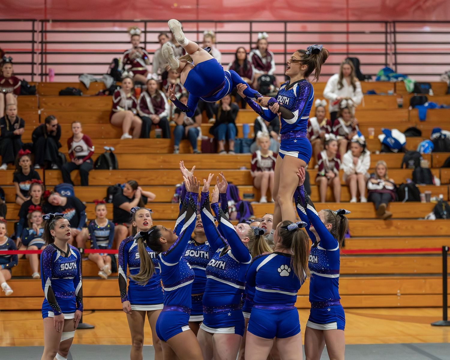 Fv3 Media Athlete Ambassador Destinee Garcia - Cheerleader for Nashua High School South cheering as a flyer at a NHIAA spirit competition