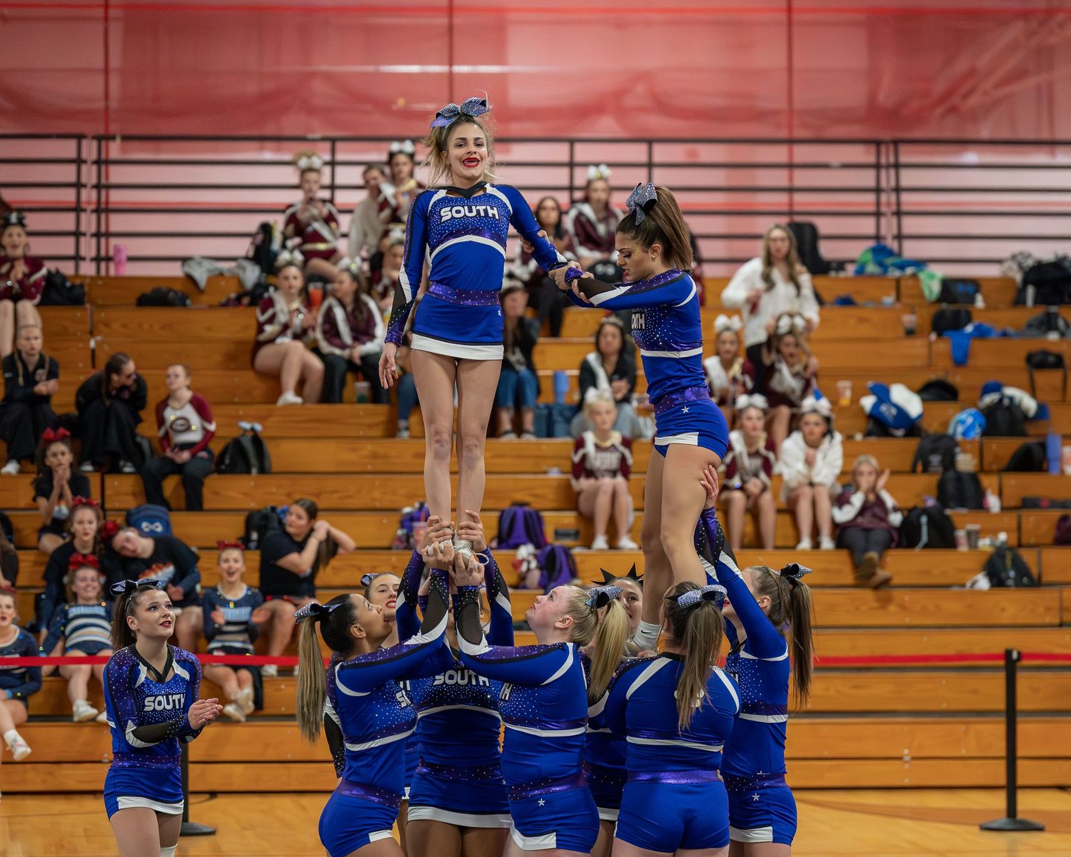 Fv3 Media Athlete Ambassador Destinee Garcia - Cheerleader for Nashua High School South cheering as a flyer at a NHIAA spirit competition