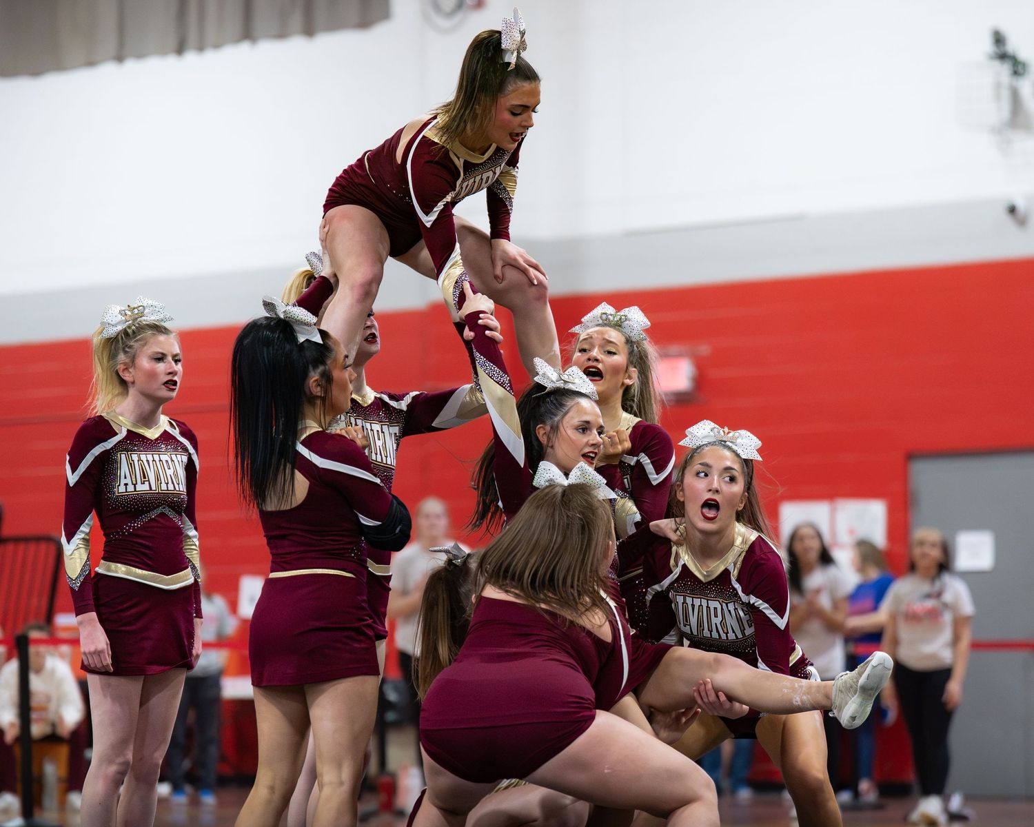 Fv3 Media Athlete Ambassador Abby Labonte - Cheerleader Captain for Alvirne High School cheering as a base at a NHIAA spirit competition