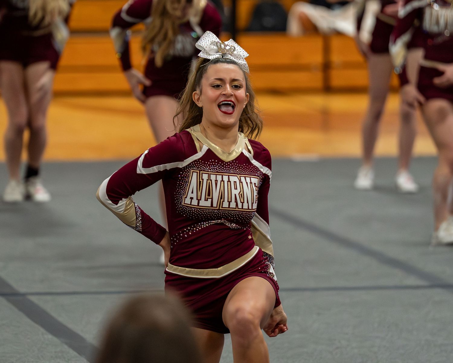Fv3 Media Athlete Ambassador Indi Guilbeault - Cheerleader Captain for Alvirne High School cheering as a base at a NHIAA spirit competition