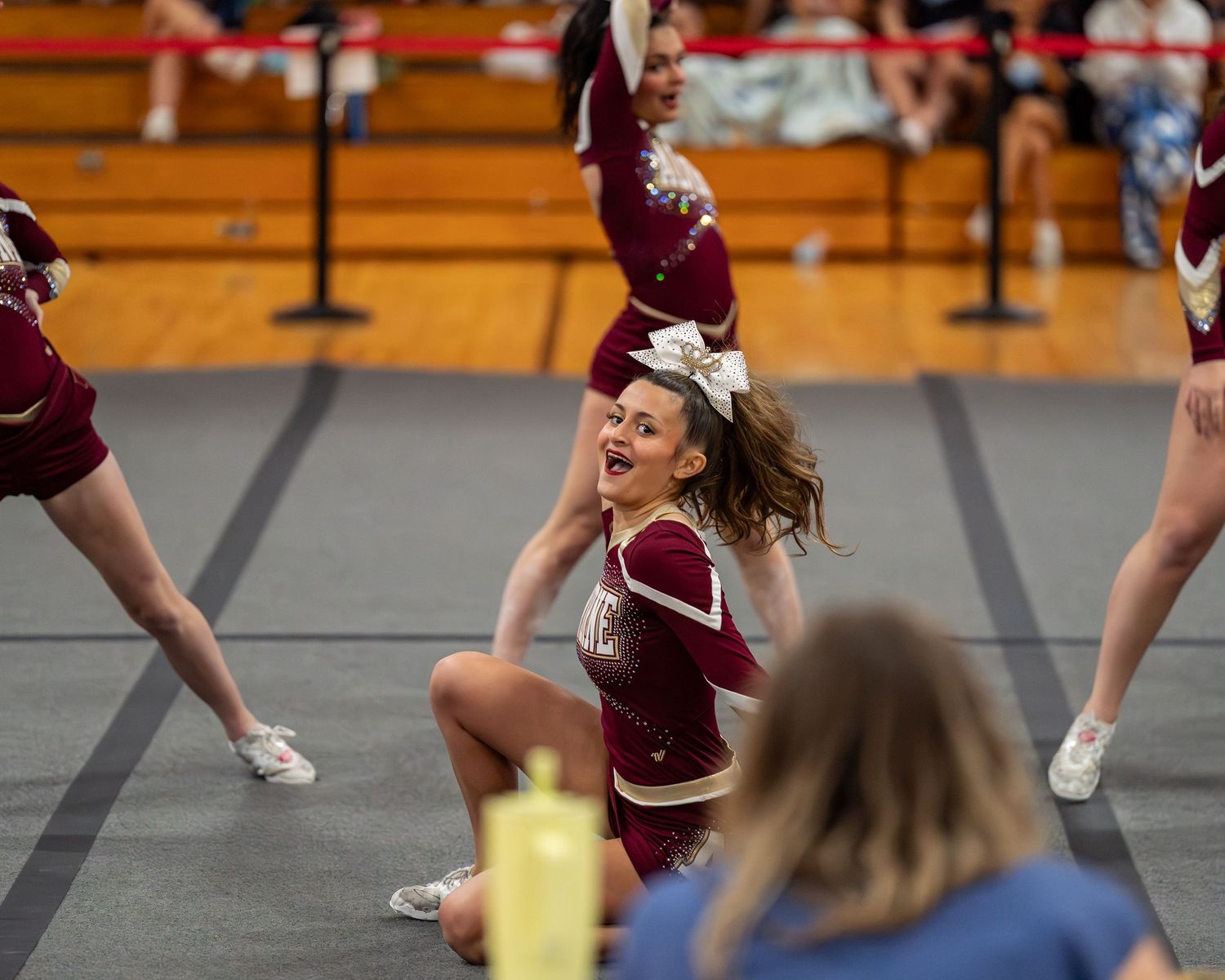 Fv3 Media Athlete Ambassador Indi Guilbeault - Cheerleader Captain for Alvirne High School cheering as a base at a NHIAA spirit competition