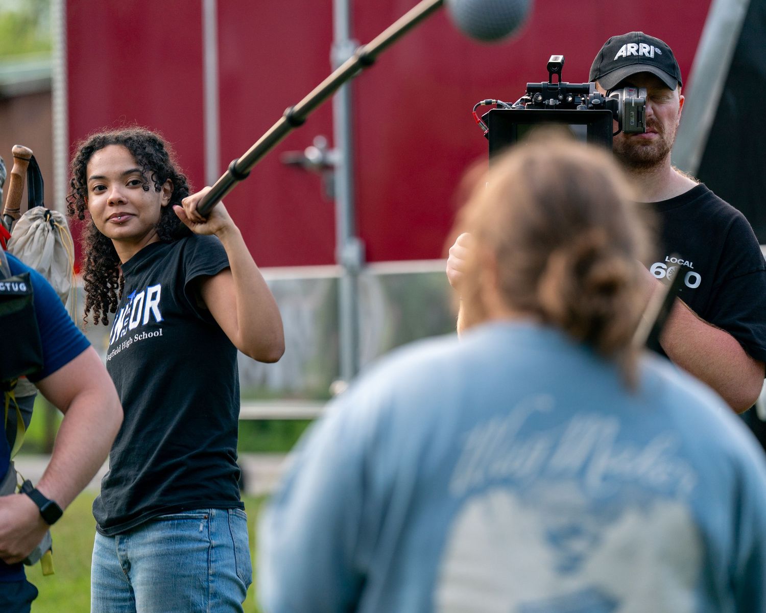Behind the scenes photo of boom operator Alleyna Pitaso on the set of New England hiking drama feature film All You Have in Lincoln NH