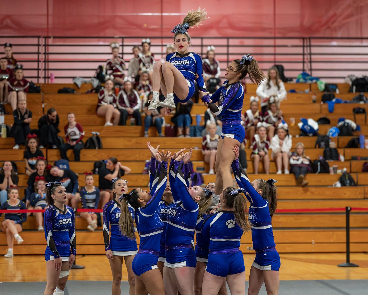 Fv3 Media Athlete Ambassador Destinee Garcia - Cheerleader for Nashua High School South cheering as a flyer at a NHIAA spirit competition