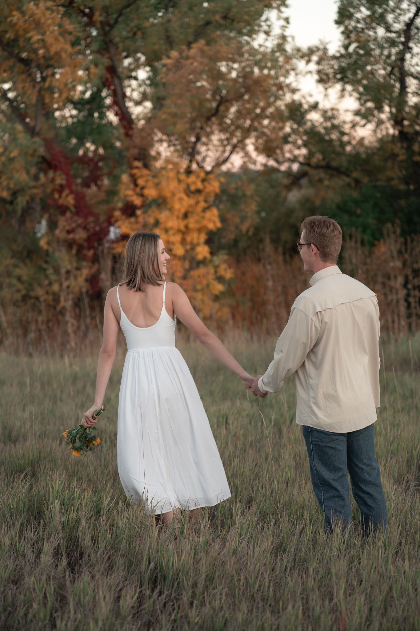 Colorado western couples photography capturing authentic love in open landscapes, cowboy boots, golden light, and honest connection