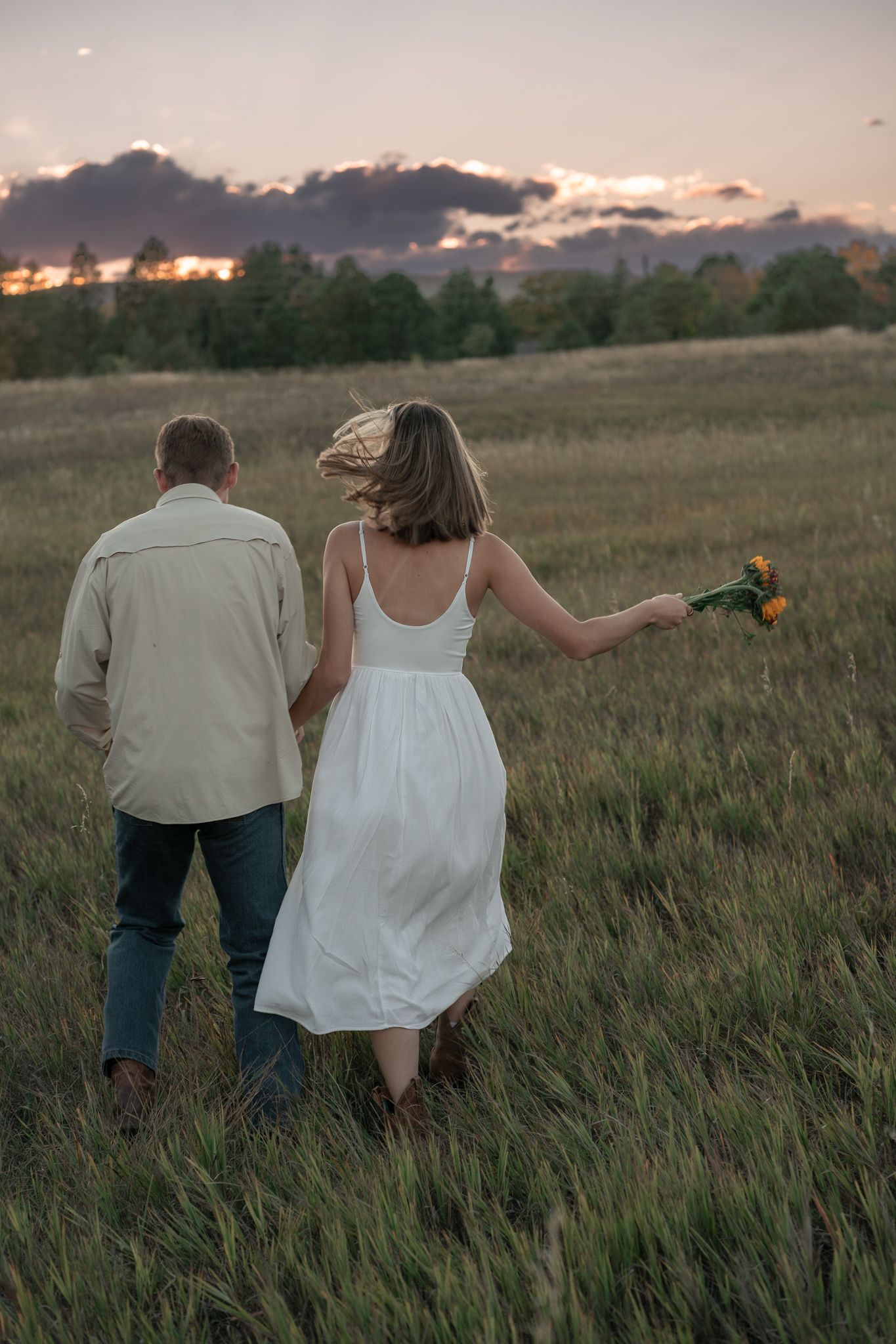 Colorado western couples photography capturing authentic love in open landscapes, cowboy boots, golden light, and honest connection