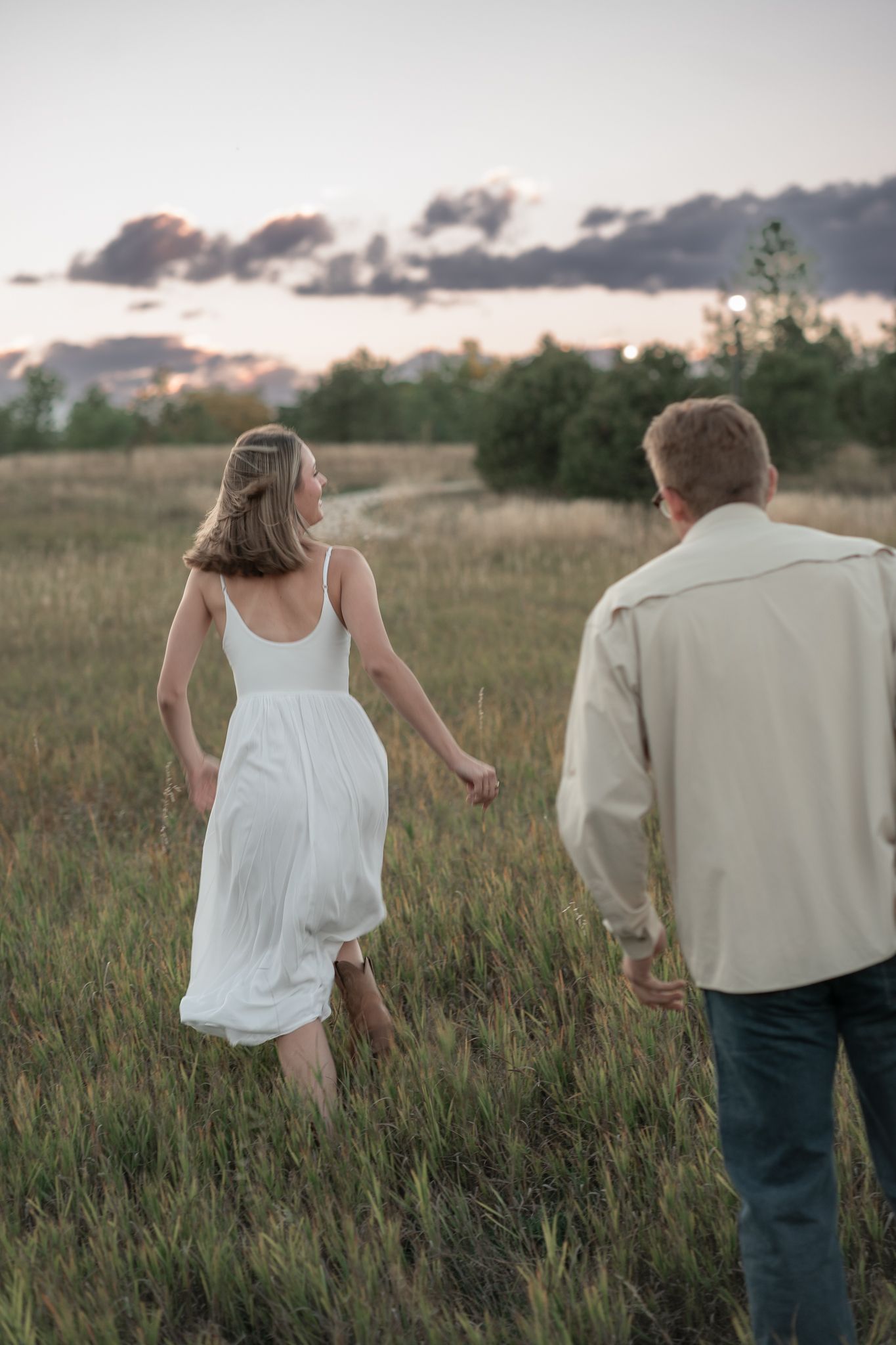 Colorado western couples photography capturing authentic love in open landscapes, cowboy boots, golden light, and honest connection
