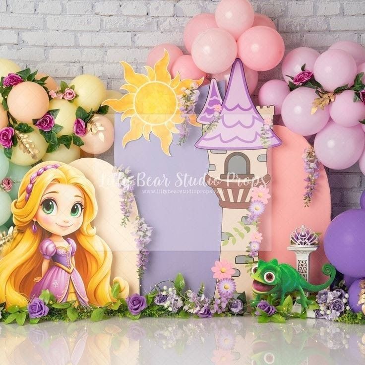 Rapunzel themed party backdrop with castle, balloons, flowers, and Pascal the chameleon decorations.