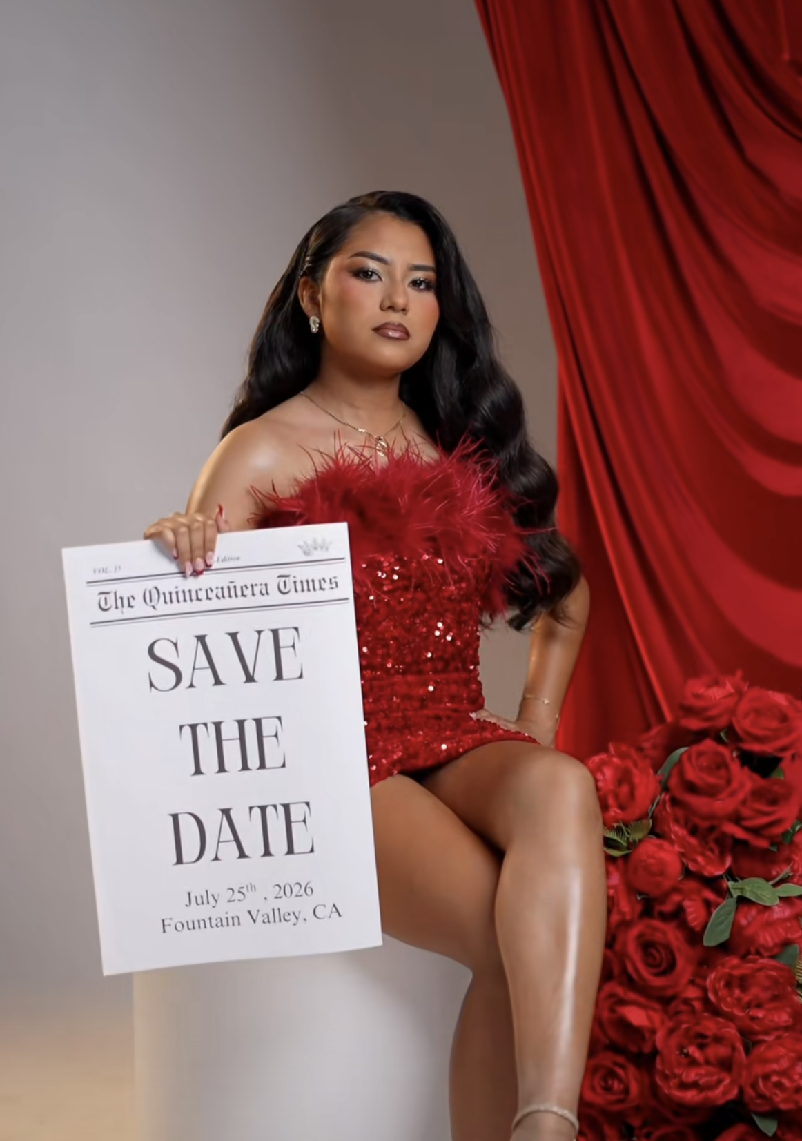 Young woman in red sequin dress holds Save the Date sign for Quinceañera, July 25, 2026, Fountain Valley, CA.