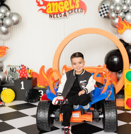 A sequence of racing-themed toy car photos showing assembly and play on a black and white checkered surface.
