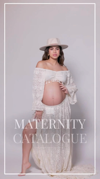 Maternity photo collection featuring ethereal white lace dresses and romantic styling against neutral studio backdrop.
