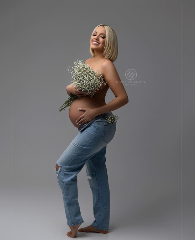 Pregnant woman in jeans and floral top poses playfully in a studio against a gray backdrop in a photo collage.