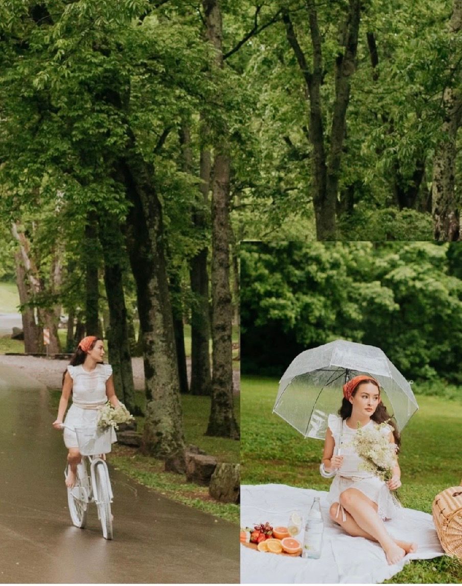 Woman in white dress rides bicycle through tree-lined path, while another scene shows her at a picnic with a clear umbrella.