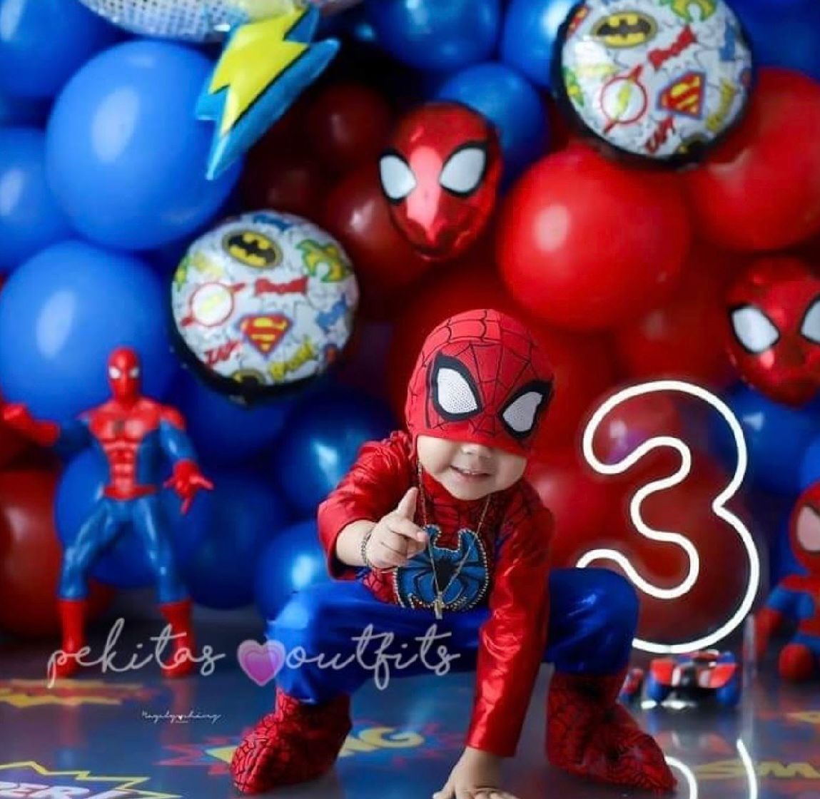 Toy Spider-Man action figures and collectibles arranged in a creative photography sequence with red and blue lighting effects.
