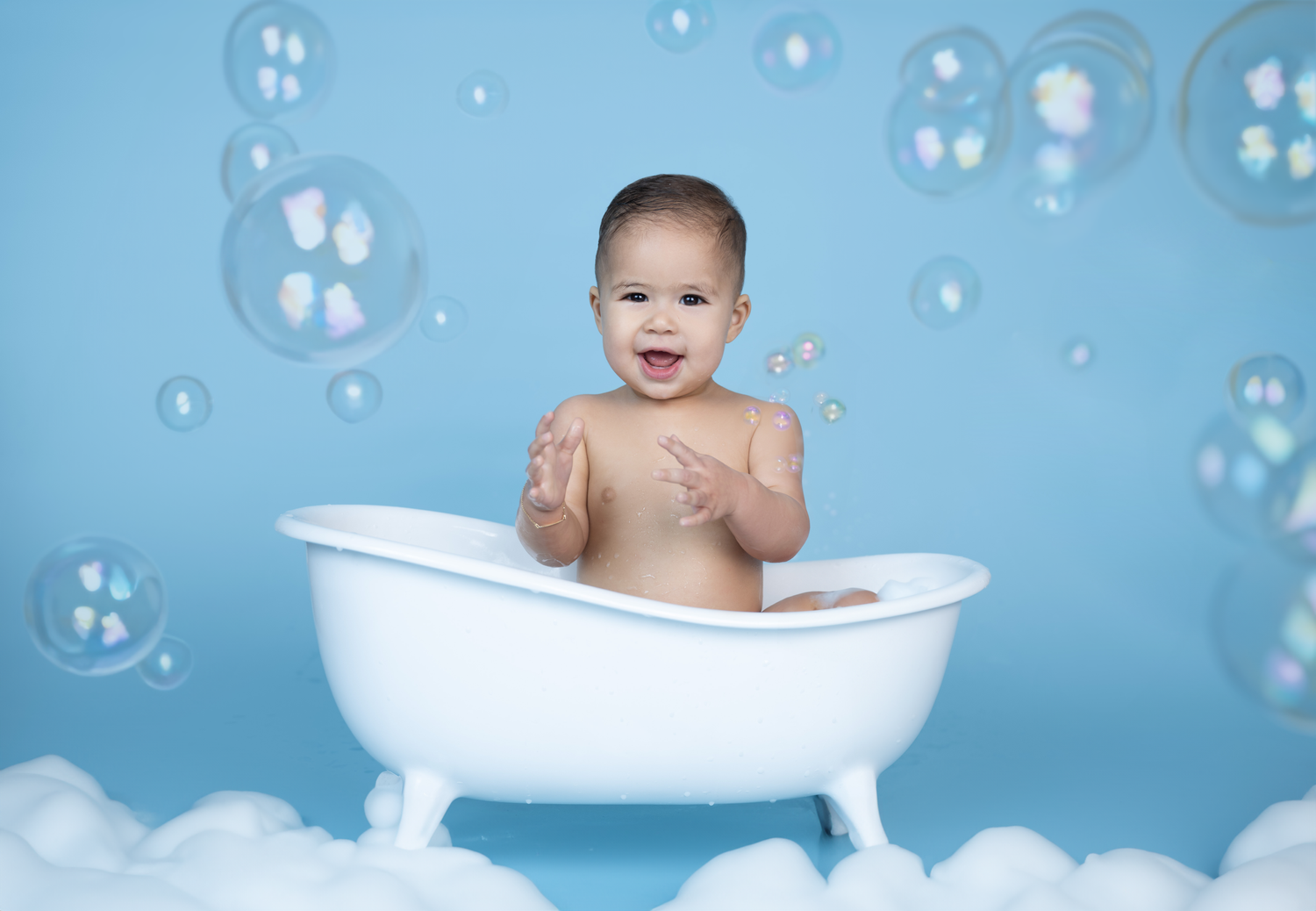 Joyful bath time scene with bubbles floating around white vintage tub against blue backdrop.