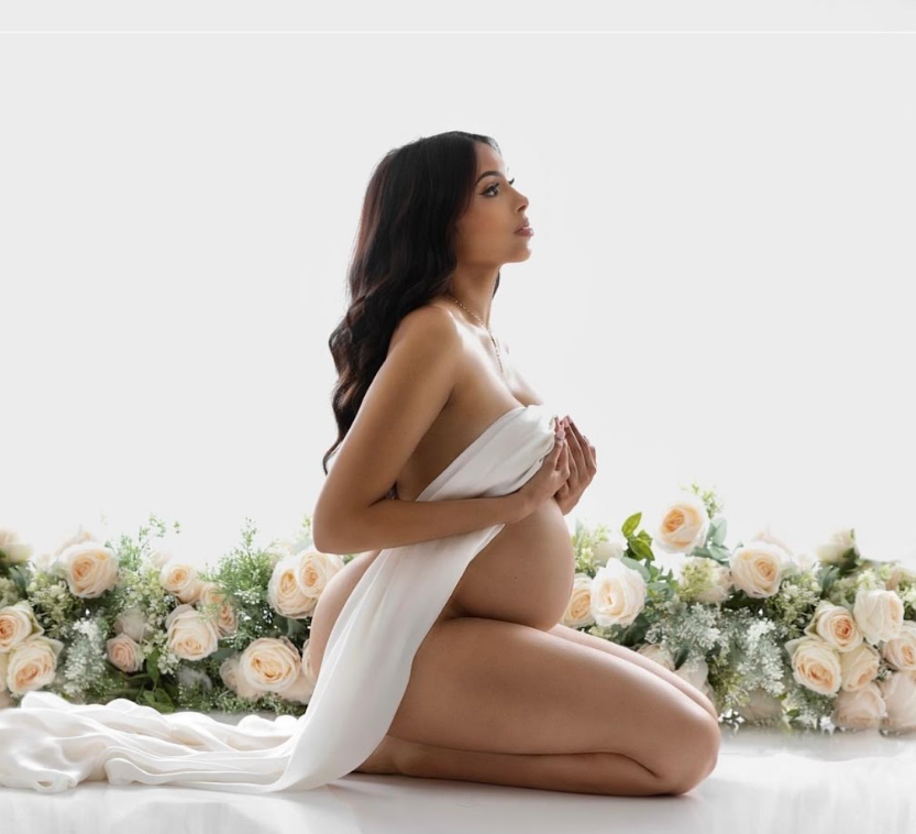 A series of artistic maternity photos with white fabric and floral arrangements in soft natural light.