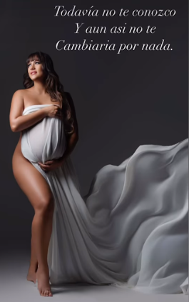 Artistic maternity photos with flowing gray fabric against dark background creating elegant silhouettes.