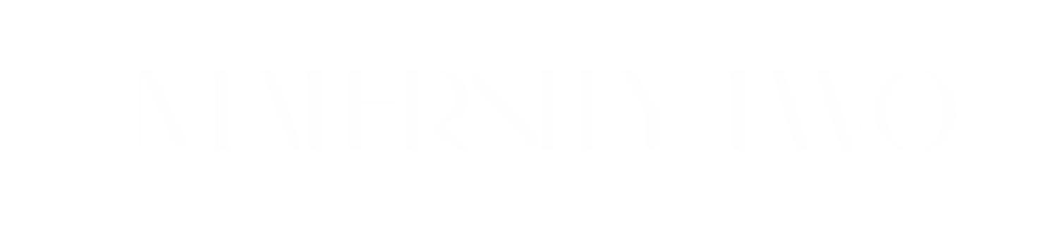 A minimalist white background with subtle light gray text or logo design centered in the composition.