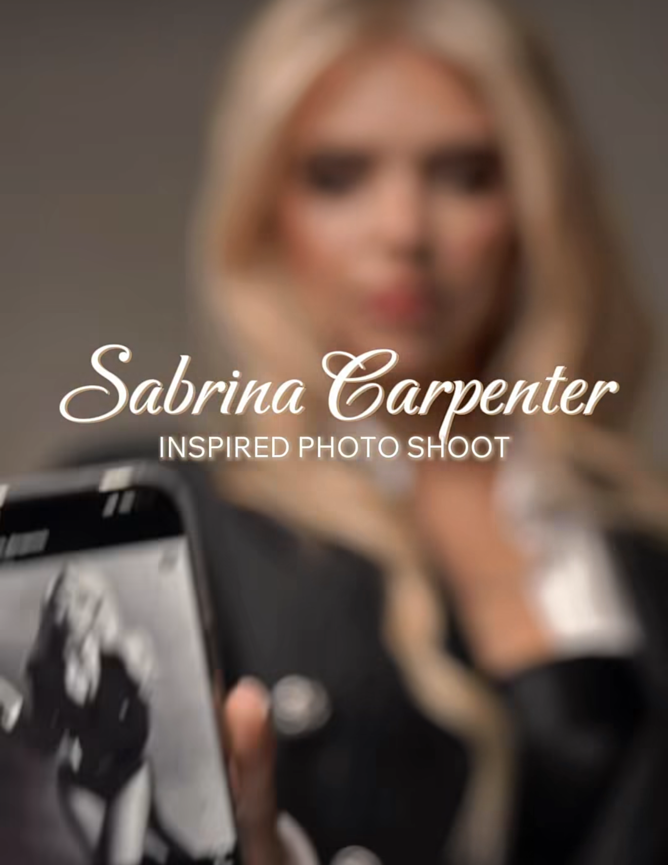 Sabrina Carpenter inspired photo shoot featuring a blonde woman holding a smartphone displaying a black and white image.