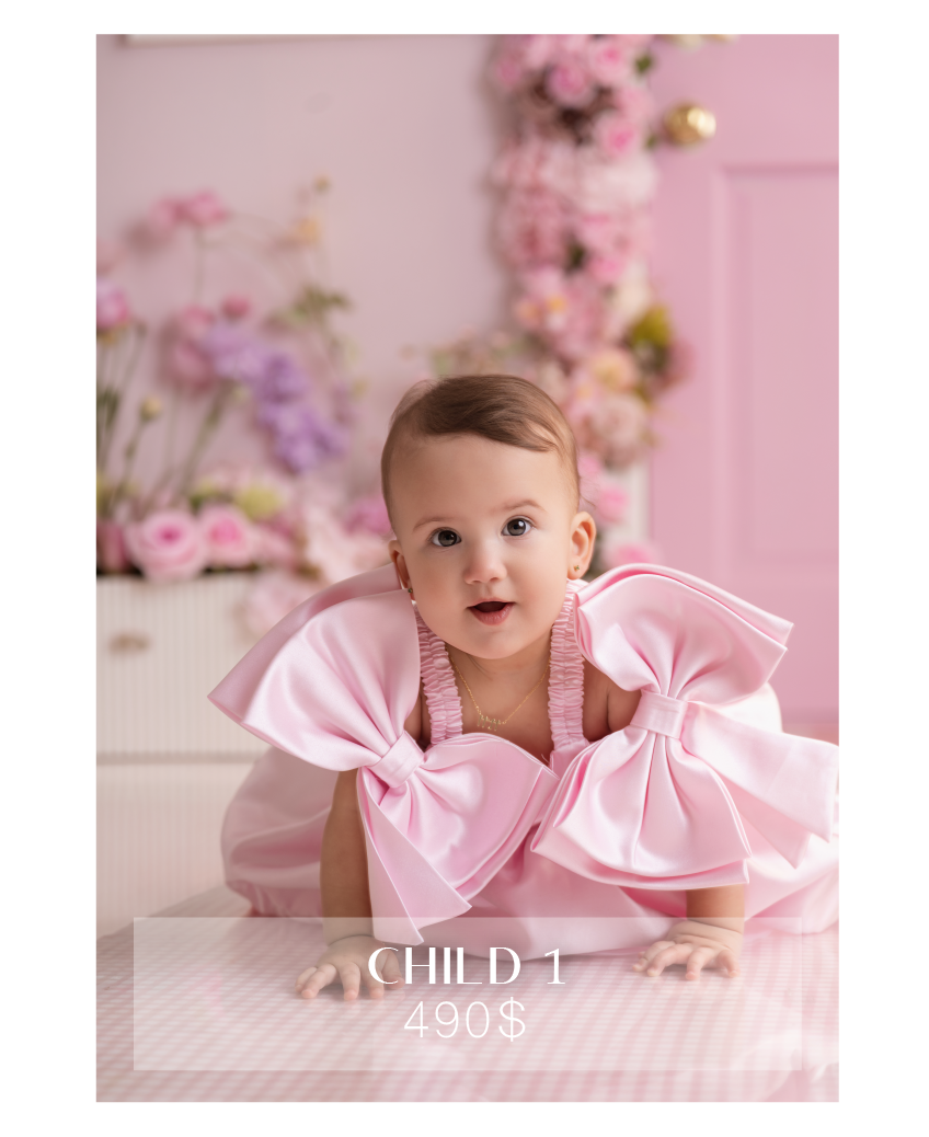 A baby in a pink bow dress poses in a floral pink studio, labeled Child 1 at $490.