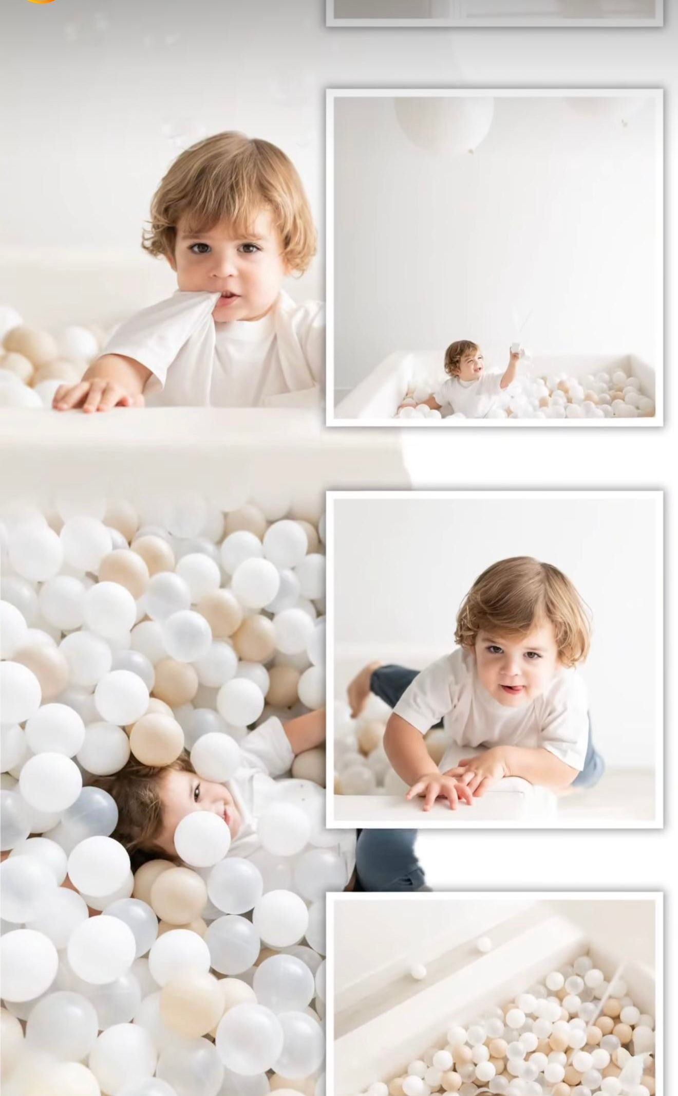 Toddler boy playing in white and beige ball pit, smiling and crawling among hundreds of soft pastel balls.
