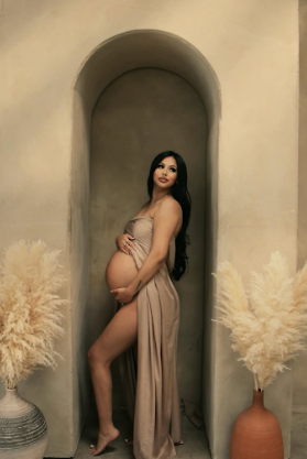 A moody artistic photo series showing a figure in a beige dress posed against arched alcoves with pampas grass decor.