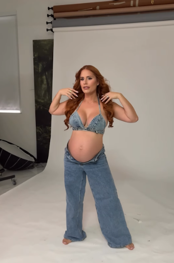 Woman in denim jeans and bra top poses in various positions against white studio background.