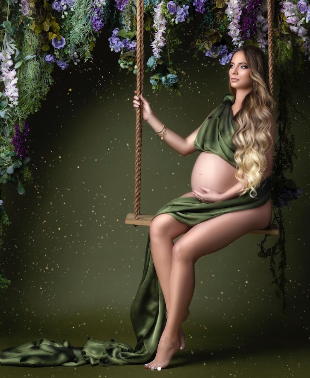 A dreamy portrait series with purple wisteria flowers and a rope swing against a moody dark green backdrop.