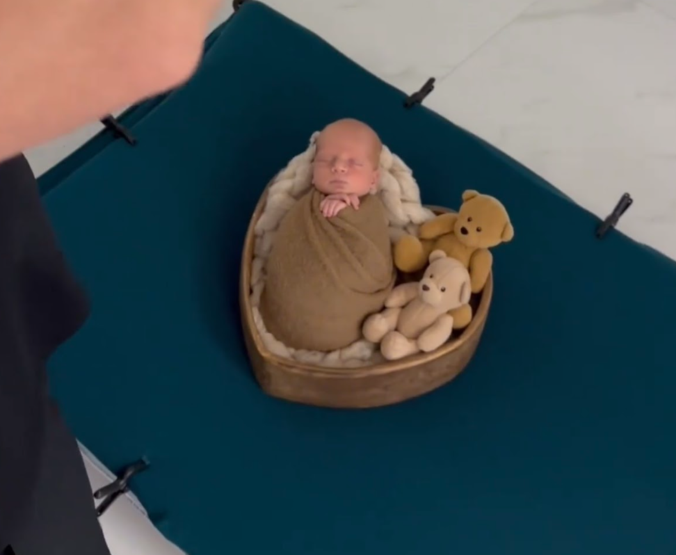 Time-lapse sequence shows clay sculpture being formed into a round shape on a dark surface.