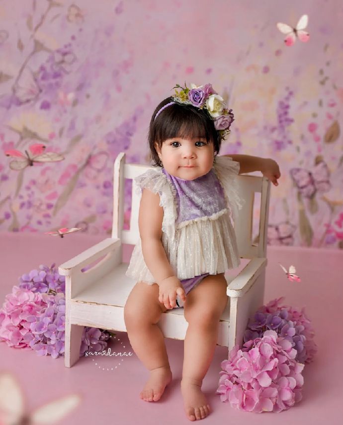 A series of whimsical pink and purple photos featuring small bare feet on a white chair with butterfly decorations.