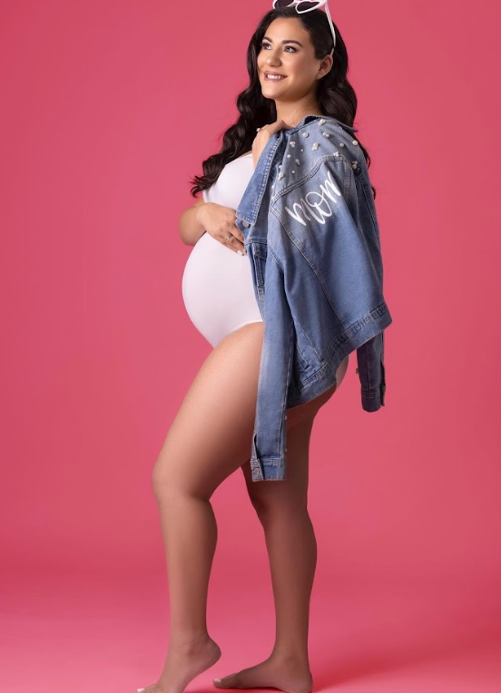 Maternity photo series showing a pregnant woman in white against pink backdrop holding a denim jacket in various poses.