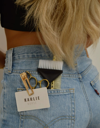 Close-up shots of denim jacket details showing gold hair accessories and styling tools clipped to the back pocket.