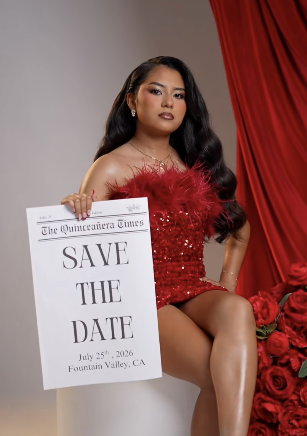 Young woman in red sequin dress holds Save the Date sign for July 25, 2026 Quinceañera in Fountain Valley, CA.