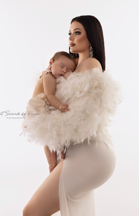 A glamour photoshoot series featuring a model in a white bodysuit with dramatic feather details in elegant poses.