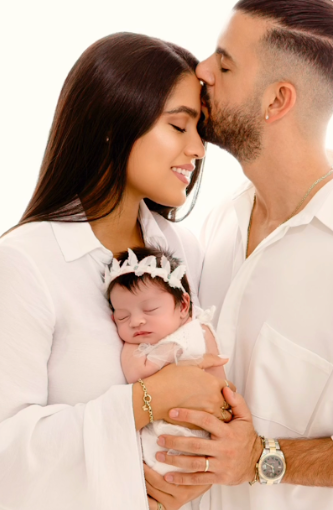 Intimate family portrait series in white clothing showing tender moments together.