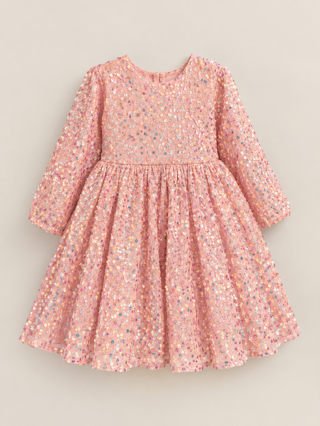 Pink long-sleeve girls' party dress with all-over multicolor sequins, a fitted bodice, and a full twirly skirt.