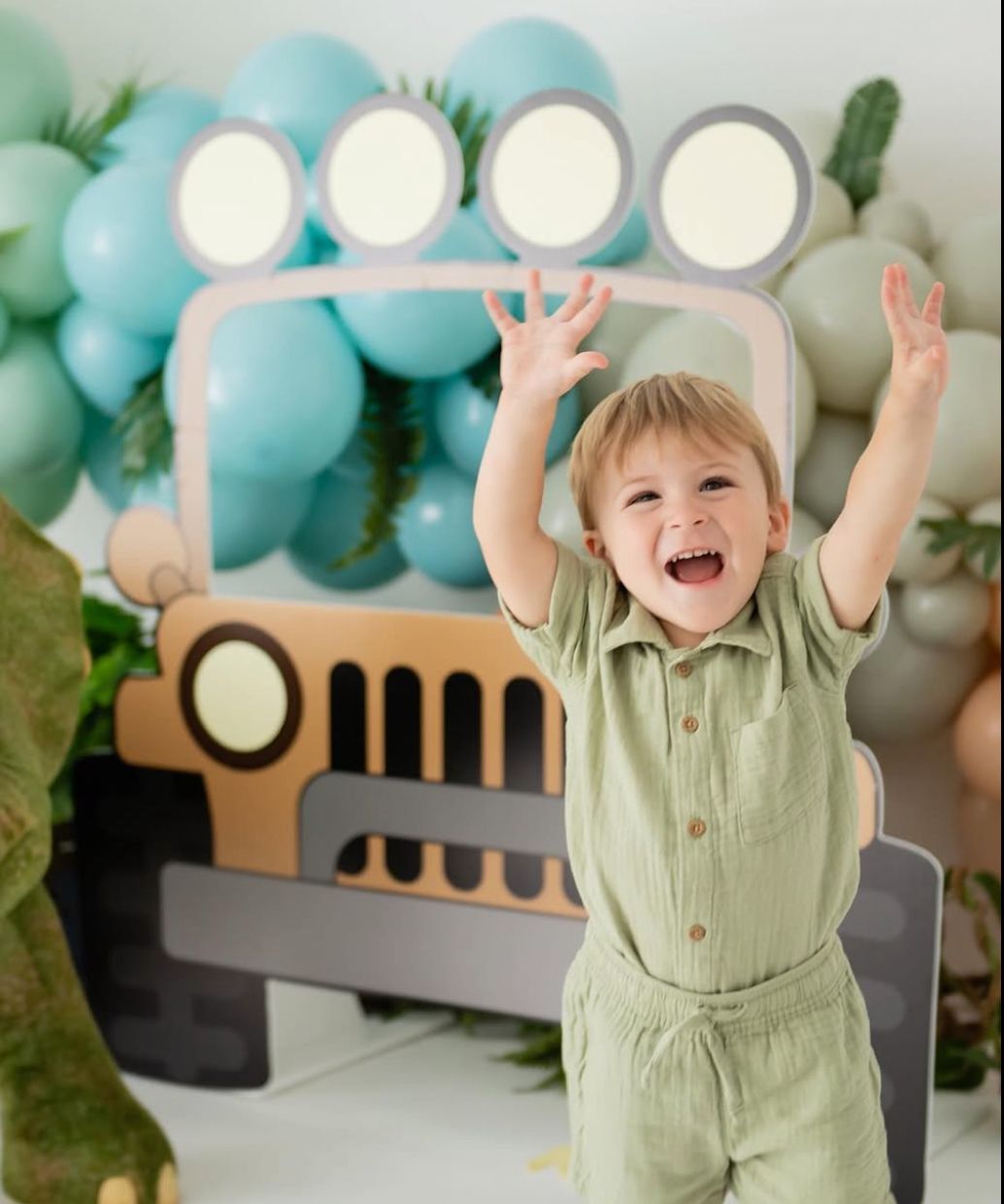 Birthday party setup with blue balloons and white circular backdrops creating a festive atmosphere.