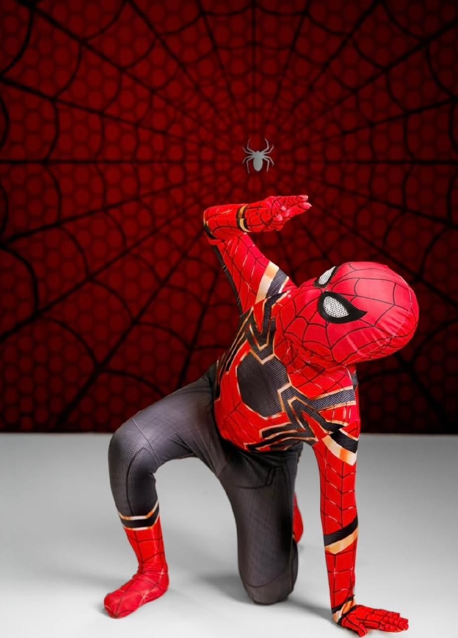Spider-Man costume against a dark red background with web pattern and silver spider decoration.