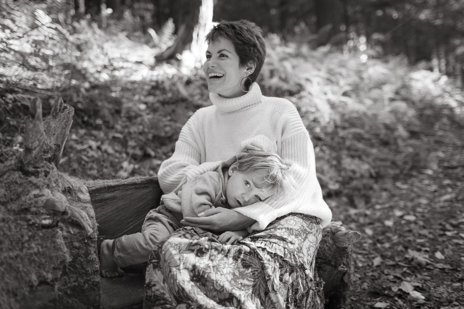 A peaceful moment of rest on a rock in a quiet forest setting.