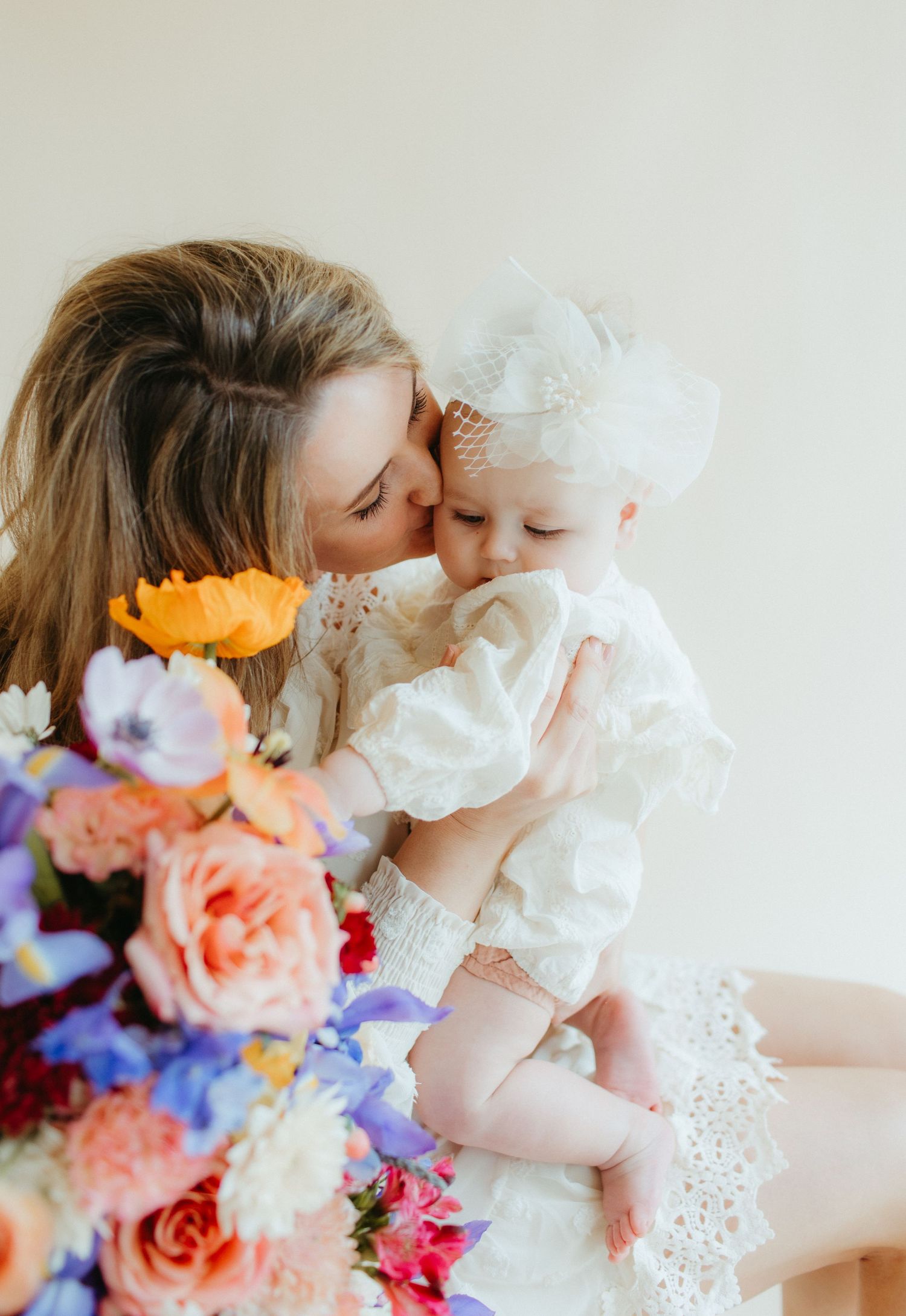 Intimate moment with flowers featuring white lace details and bright blooms.