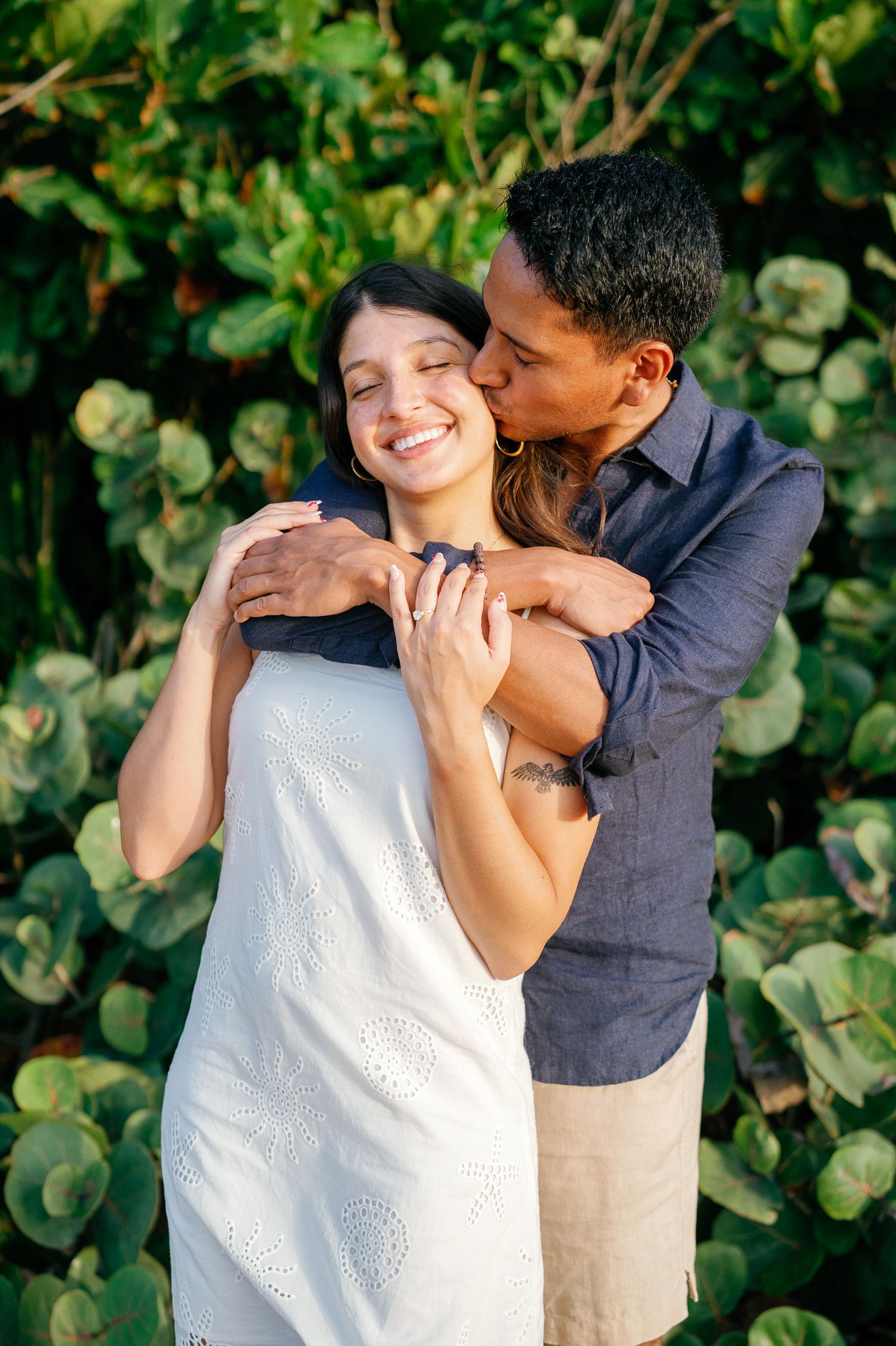 A couple shares tender moments in a romantic photo sequence against lush green foliage background.