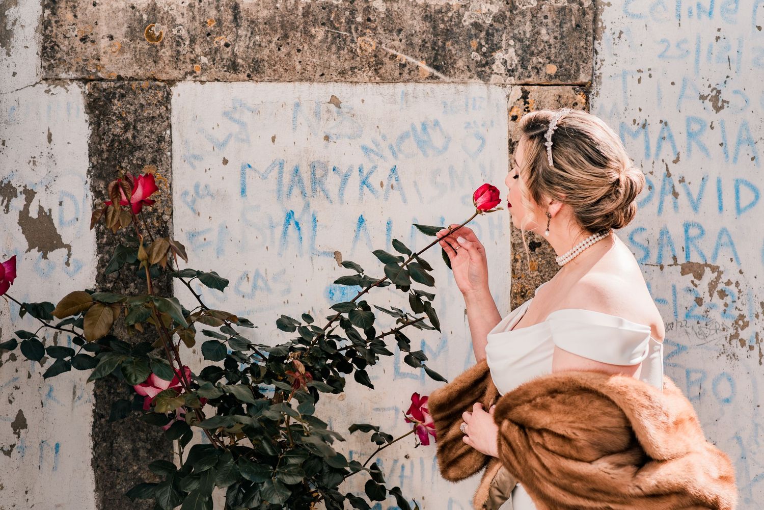 Destination wedding couple sharing a quiet moment in Óbidos, Portugal.