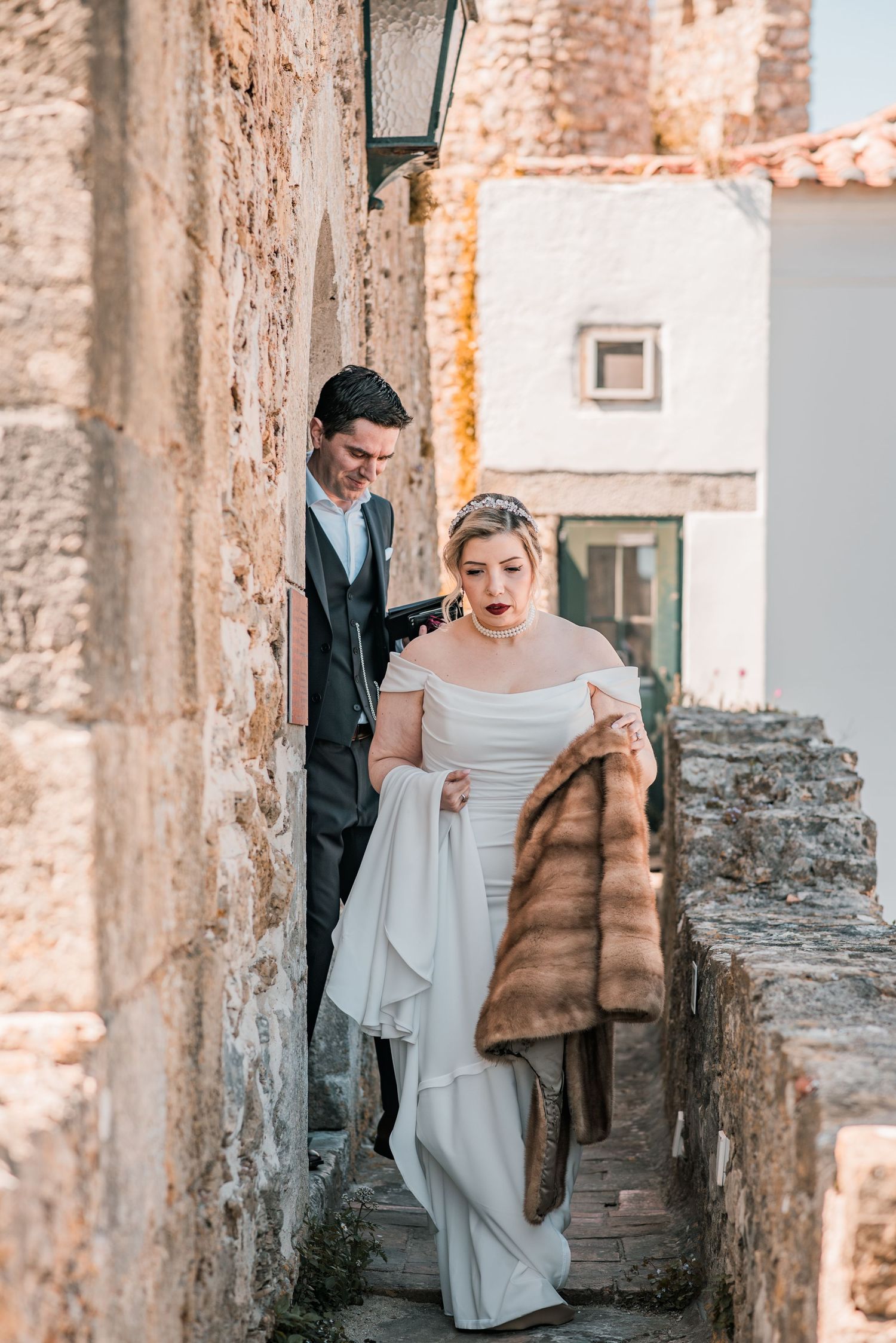 Couple from San Francisco celebrating their intimate wedding in Óbidos surrounded by close family and friends.